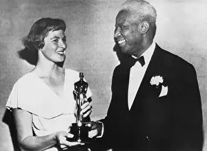 Scandinavian Prints: Swedish actress, Ingrid Bergman presents a special Academy Award to actor James Baskett