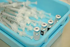Medicine Prints: Syringes to be used for COVID-19 vaccinations sit in a tray at a US Veterans Medical Center in Bay Pines