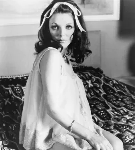 Sitting On Bed Prints: TALES THAT WITNESS MADNESS, Joan Collins, 1973