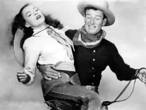 Saddle Prints: TALL IN THE SADDLE, Ella Raines, John Wayne, 1944