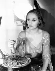 Bankhead Prints: Tallulah Bankhead, on the Paramount lot, ca. 1932, plsying with a nail-board game