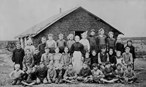 Teacher Prints: Teacher and children in front of sod schoolhouse in Woods County