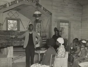 Alabama Prints: Teacher conducting school in a Baptist Church, Gees Bend, Alabama, April 1937