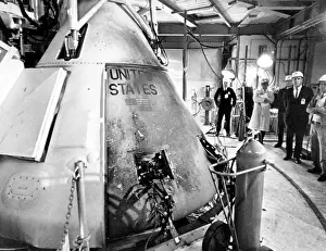 Outer Space Prints: Technicians viewing the Apollo spacecraft where three flight crew members died during a launch simulation test