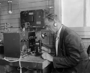 Testing Prints: Technologist at the U.S. Naval Research Laboratory operating a telephone connected to electronic equipment