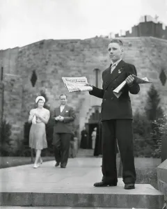Newspapers Prints: Teenager selling Father Coughlin's newspaper