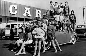 Fads Prints: Teenagers would attempt to get this crowd into a Volkswagen Beetle