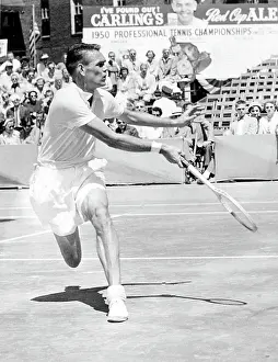 Tennis Court Prints: Tennis champion Jack Kramer, playing against Pancho (Francisco) Segura