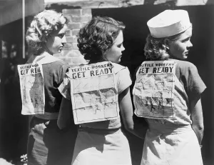 North Carolina Prints: Textile workers displaying picket signs pinned on their backs during Labor Day demonstration in Gastonia