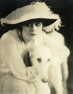 Feathered Hat Prints: Theda Bara with her Russian wolfhound, Belva, 1916