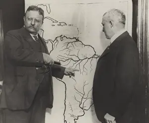 Explorers Prints: Theodore Roosevelt pointing at the area explored during the Roosevelt-Rondon Scientific Expedition