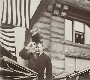 Chicago Prints: Theodore Roosevelt tipping his hat in an open carriage, Chicago, 1903 (BSLOC_2017_4_56)