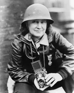 Photographers Prints: Therese Bonney, photographer, wearing the medal of the White Rose of Finland