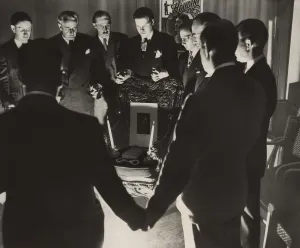 Entertainers Prints: Thirteen magicians clasping hands in a midnight sance to contact the deceased Harry Houdini