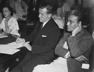 Lawyers Prints: Thomas Corcoran (center) is grilled at a House rules investigation. July 9, 1935