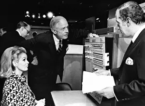 Watson Prints: Thomas J. Watson, Jr. talks with IBM stockholders before their yearly meeting in the New York Coliseum