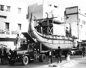 Traditional Prints: Thor Heyerdahl's second papyrus reed boat, the RA II is taken to Safi Port in Morocco