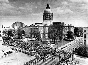 Civil Rights Prints: Thousands of mourners wind their way around the Georgia State Capitol Building following the mule-drawn wagon with