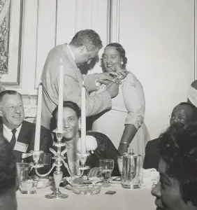 Lawyers Prints: Thurgood Marshall pins orchid on Mrs