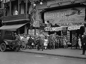 Statues Prints: Ticket holders wait in front of The Leader movie theater in Washington
