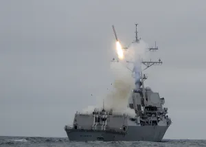 Launches Prints: Tomahawk cruise missile launches from the guided-missile destroyer USS Sterett during a weapons training exercise off