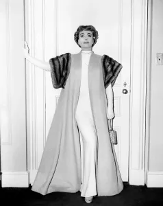 Evening Coat Prints: TORCH SONG, Joan Crawford, in a camel's-hair coat with mink trim, by Helen Rose, 1953