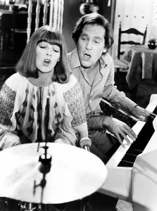 Playing Piano Prints: A TOUCH OF CLASS, from left, Glenda Jackson, George Segal, 1973