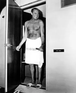 Dressing Room Prints: THAT TOUCH OF MINK, Cary Grant comes out of his dressing room while filming