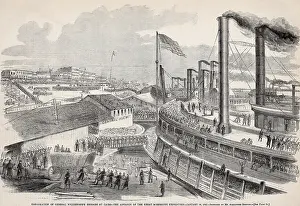 Port Prints: Several troop transport ships take on equipment