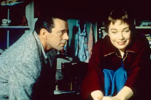 August Prints: THE TROUBLE WITH HARRY, from left: John Forsythe, Shirley MacLaine, 1955