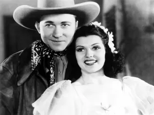 Ritter Prints: TROUBLE IN TEXAS, from left: Tex Ritter, Rita Hayworth as Rita Cansino, 1937