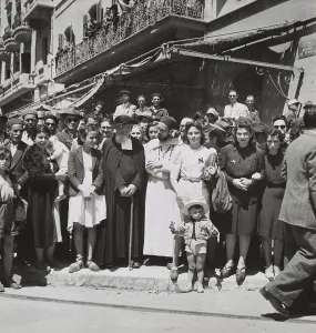 Sidewalk Prints: Tunisian civilians at the Allied Victory parade in Tunis