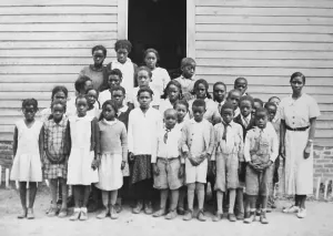 Boys Prints: Twenty-six African American students in a group portrait with their teacher