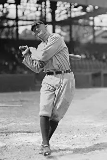 Batting Prints: Ty Cobb in a 1913 batting photo taken in Washington