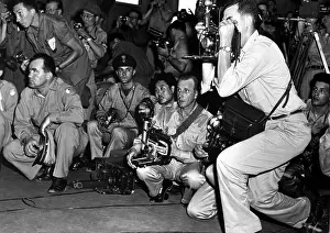 Korea Prints: U.N. correspondents and photographers at the armistice building