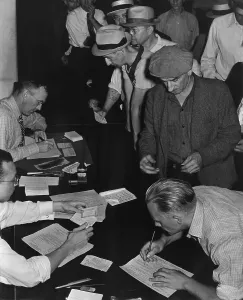 Relief Prints: Unemployed men filling out Social Security benefit claims