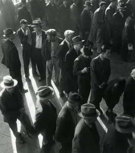 Relief Prints: Unemployed men wait in line to file Social Security benefit claims