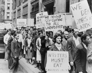 Relief Prints: Unemployed New Yorkers demonstrate with signs in front of Emergency Relief Building in 1935