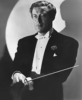 Baton Prints: UNFAITHFULLY YOURS, Rex Harrison
