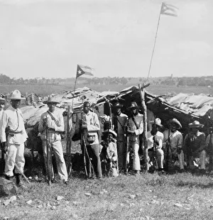 Cuba Prints: Uniformed Cuban soldiers in the field with their flag and weapons