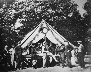 Doctors Prints: Union Army surgeon performing an amputation in a hospital tent