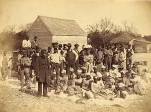 Slaves Prints: A Union soldier stands with African Americans on the plantation Thomas F