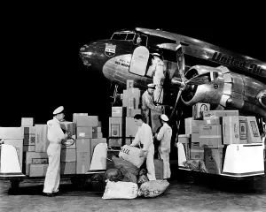 Loading Prints: United Airlines cargo airplane, 1942. Courtesy: CSU Archives/Everett Collection