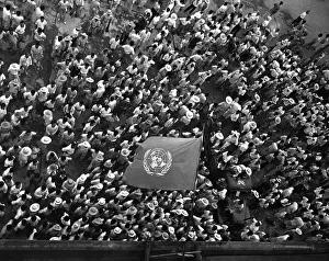 South Korea Prints: United Nations flag waves over crowd waiting to hear Dr