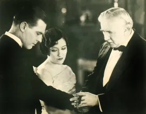 Smiley Prints: UNTAMED LADY, l-r: Lawrence Gray, Gloria Swanson, Joseph W. Smiley, 1926