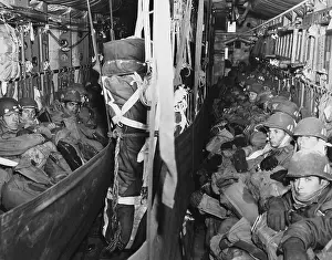 Paratroopers Prints: U.S. Airborne combat team en route to a drop zone at Munsan-ni, Korea, on March, 22, 1951