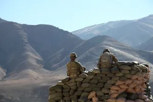 Candid Occupational Portrait Prints: U.S. Army soldiers run communications equipment from a sandbag bunker in the Daymirdad District Center Wardak province