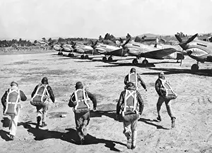 Parachutes Prints: U.S. Flying Tiger pilots run to their fighter planes at an advanced U
