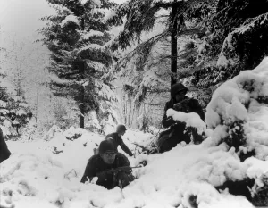 Cold Prints: U.S. infantrymen of the 290th Regiment fight in fresh snowfall near Amonines