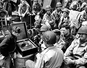 English Channel Prints: U.S Infantrymen listen to a phonograph on their way to Utah Beach